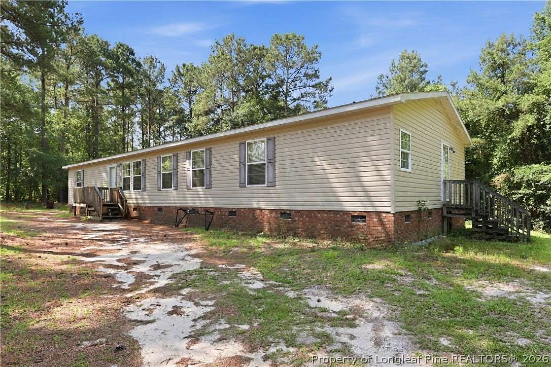 1.8 Acres of Land with Home for Sale in Tar Heel, North Carolina