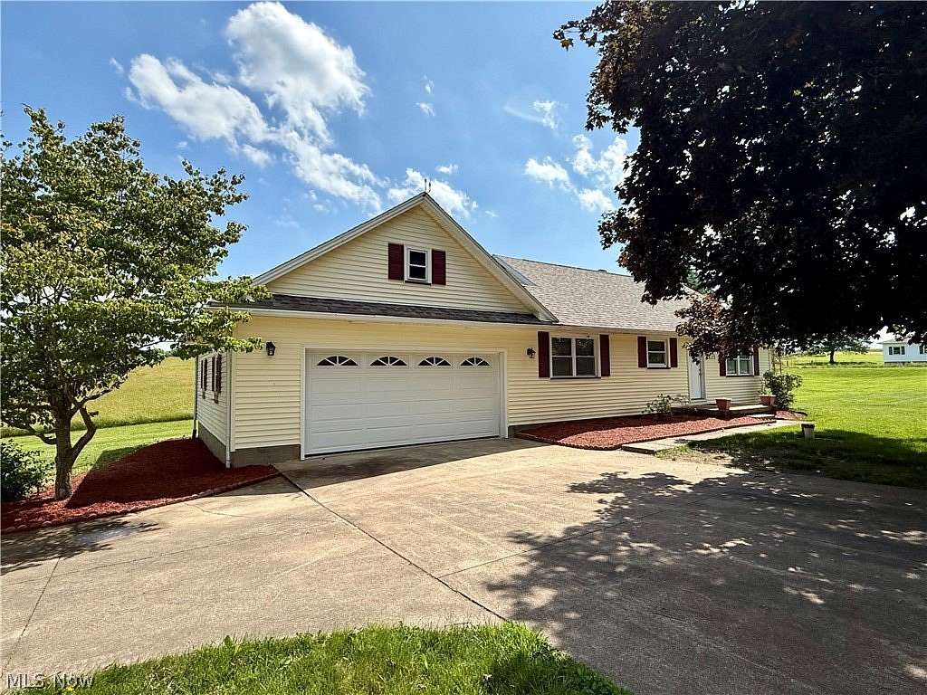 1.5 Acres of Land with Home for Sale in Carrollton, Ohio