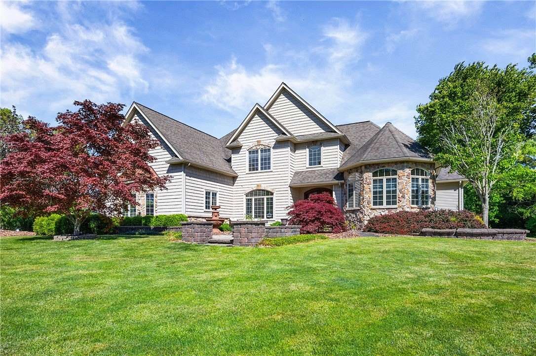 1.59 Acres of Land with Home for Sale in Spencerport, New York