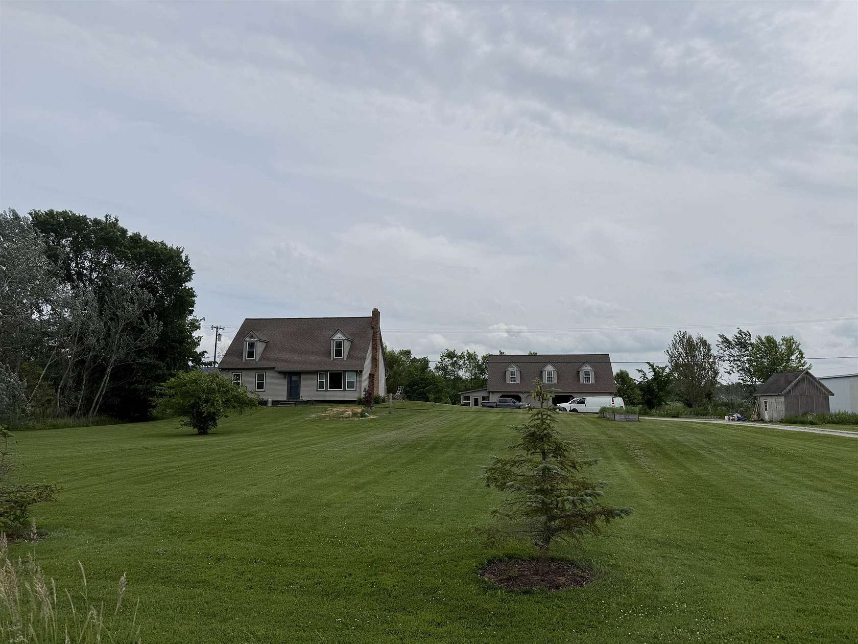 2 Acres of Land with Home for Sale in Casco, Michigan