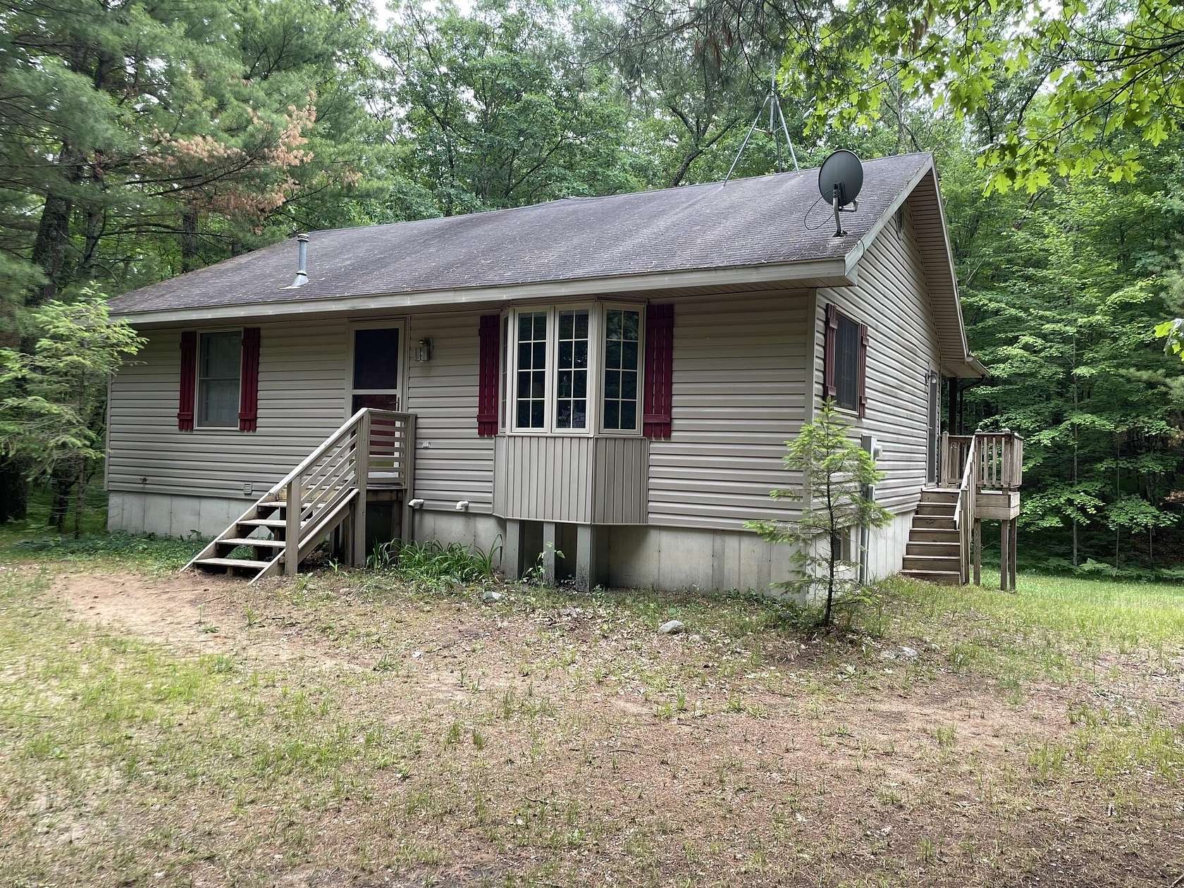 2.5 Acres of Land with Home for Sale in Irons, Michigan