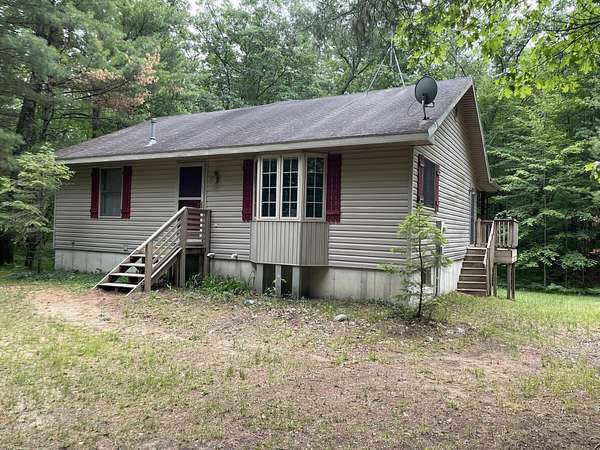 2.5 Acres of Land with Home for Sale in Irons, Michigan