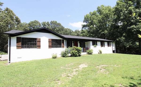 3.8 Acres of Land with Home for Sale in Wildersville, Tennessee