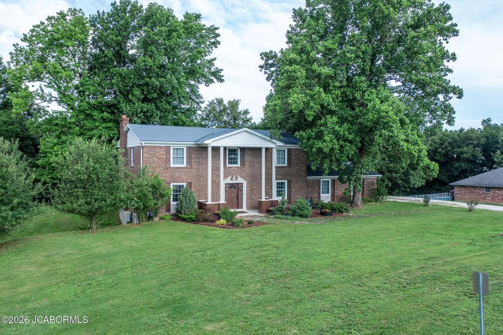 6.53 Acres of Land with Home for Sale in Holts Summit, Missouri