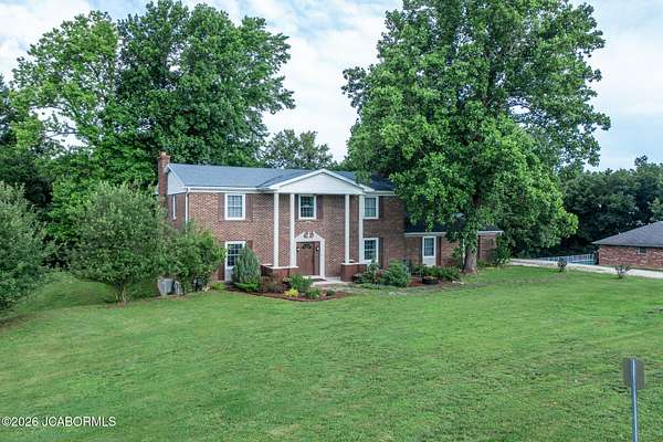 6.53 Acres of Land with Home for Sale in Holts Summit, Missouri