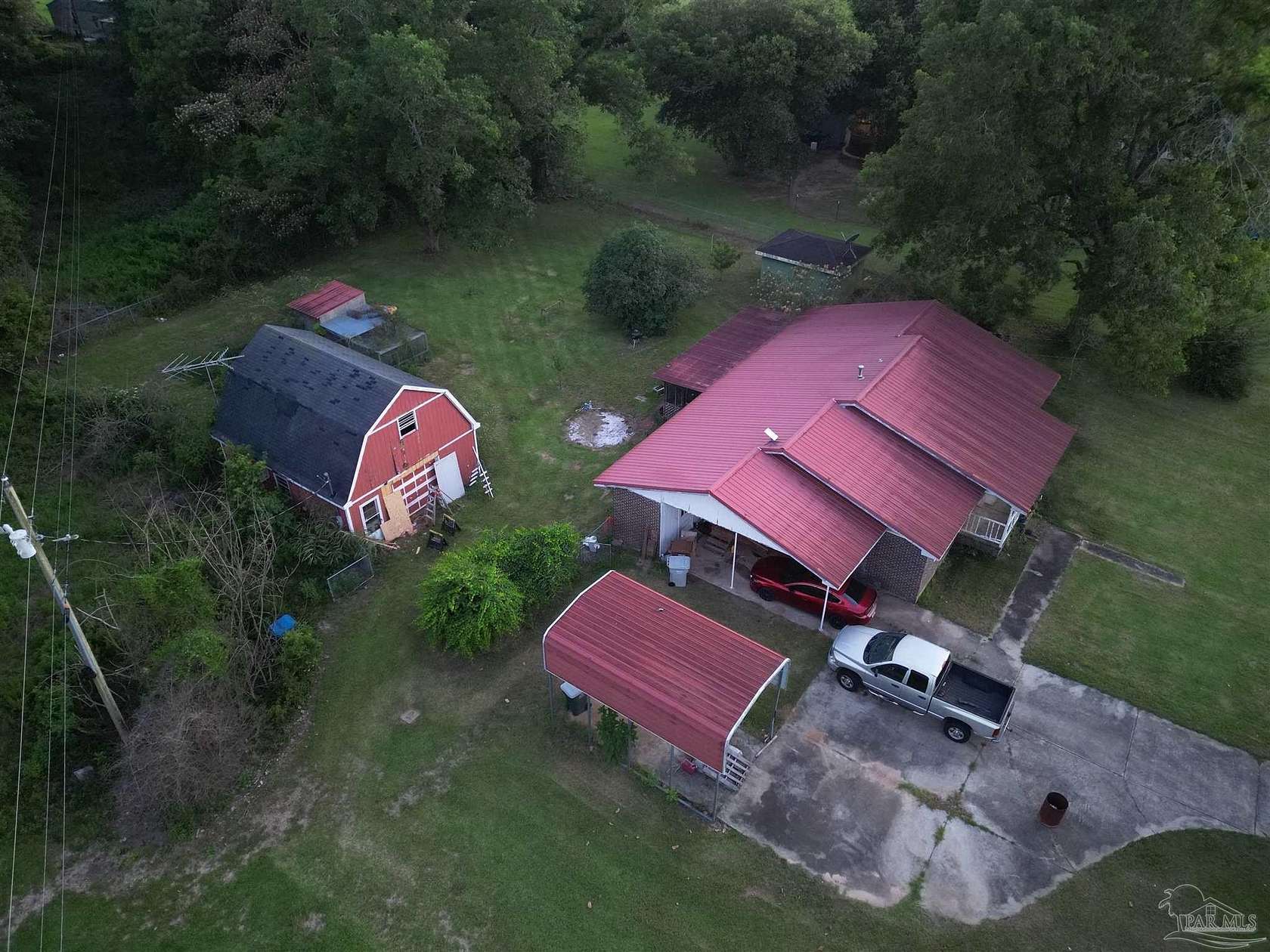 2.4 Acres of Land with Home for Sale in Jay, Florida
