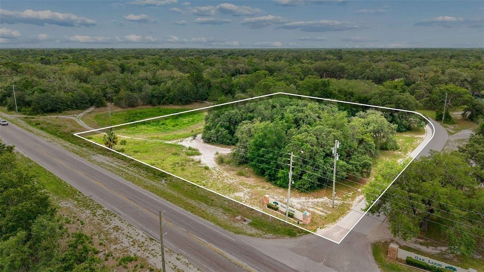 2.84 Acres of Mixed-Use Land for Sale in Spring Hill, Florida