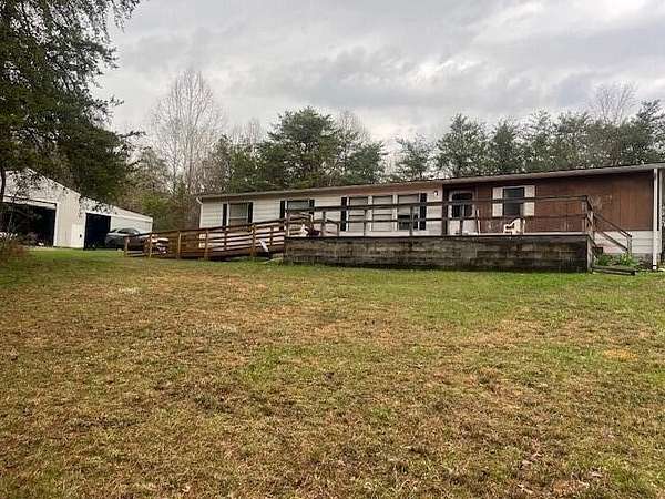 11.5 Acres of Land with Home for Sale in Rockbridge, Ohio