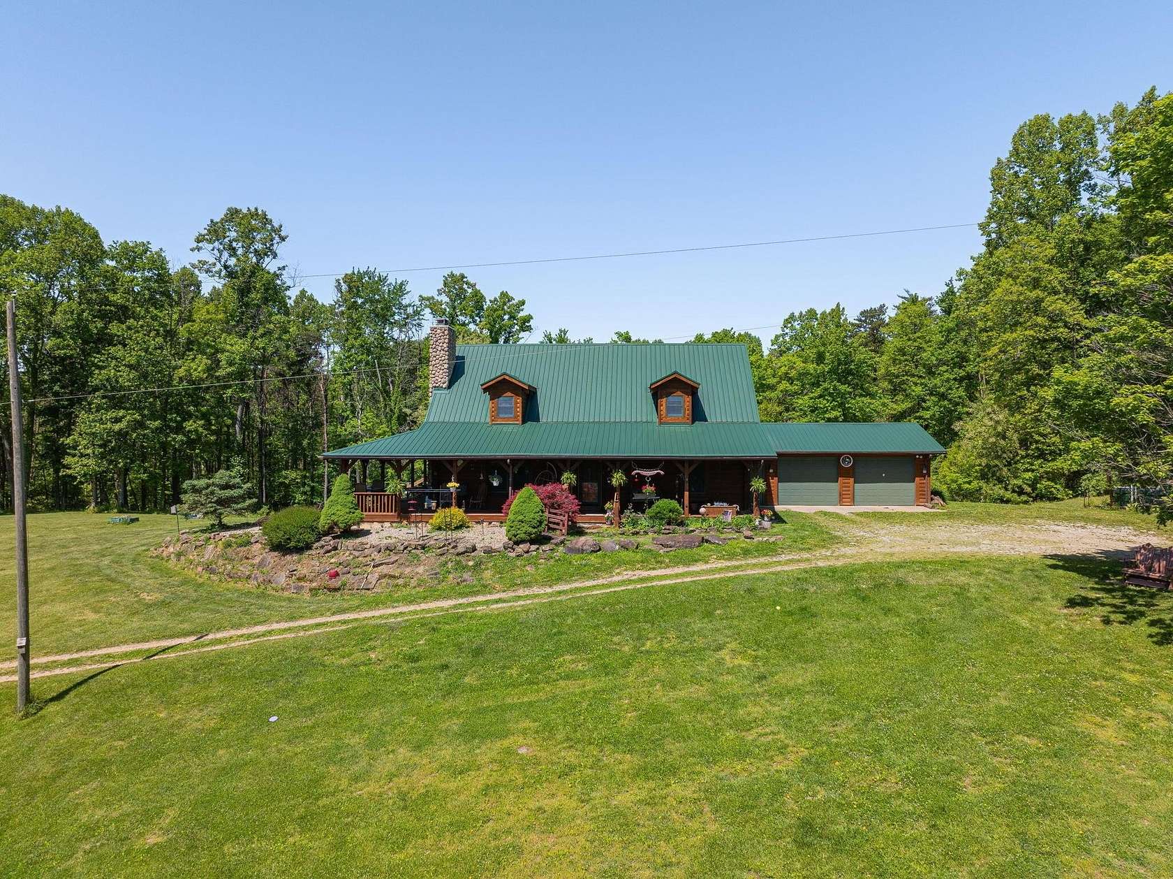 141 Acres of Land with Home for Sale in Logan, Ohio