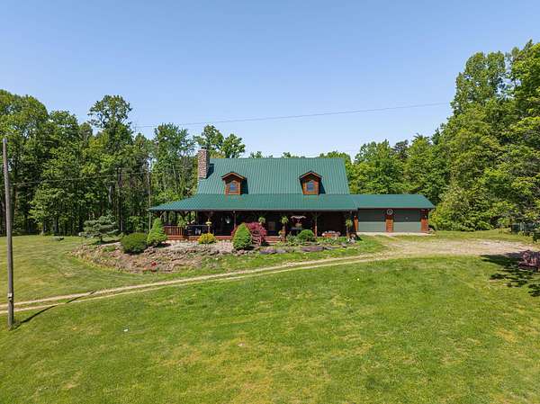 141 Acres of Land with Home for Sale in Logan, Ohio
