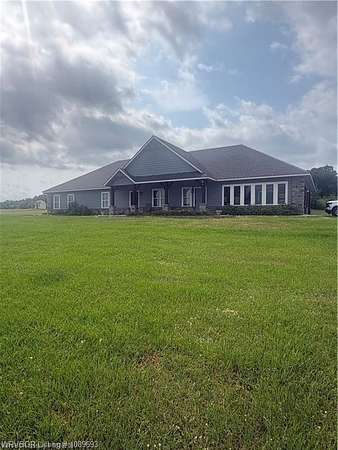 2.5 Acres of Land with Home for Sale in Howe, Oklahoma