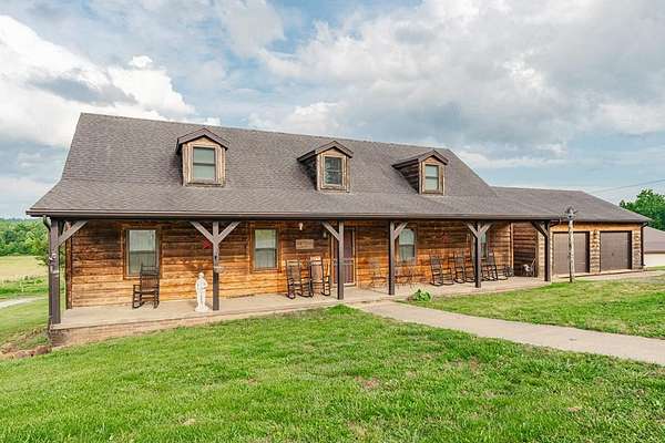 42.4 Acres of Agricultural Land with Home for Sale in Madisonville, Kentucky