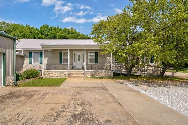 4.75 Acres of Land with Home for Sale in Strafford, Missouri
