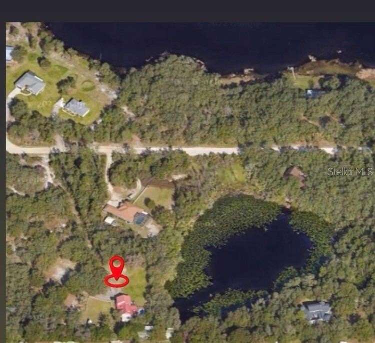 2.4 Acres of Land with Home for Sale in Orange City, Florida