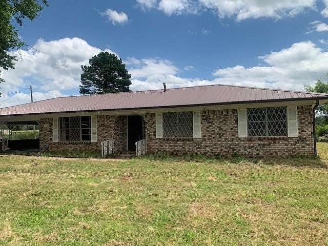6.1 Acres of Land with Home for Auction in Huntington, Arkansas