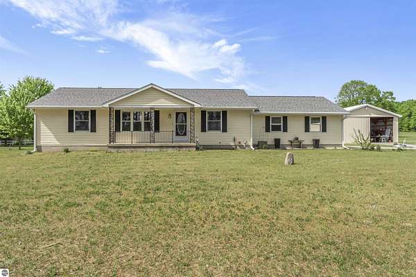 2 Acres of Land with Home for Sale in Mancelona, Michigan