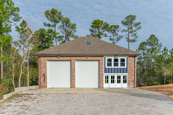 5.16 Acres of Land with Home for Sale in Navarre, Florida