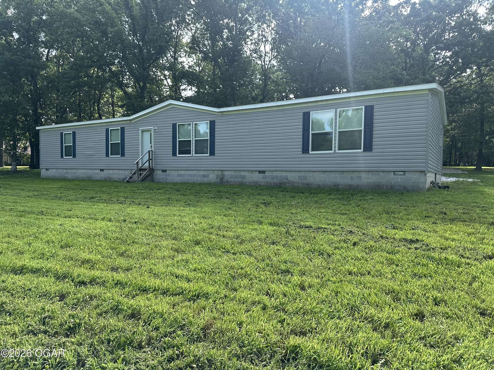 2.38 Acres of Land with Home for Sale in Carthage, Missouri