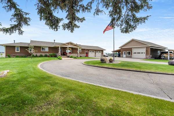5 Acres of Land with Home for Sale in Kalispell, Montana