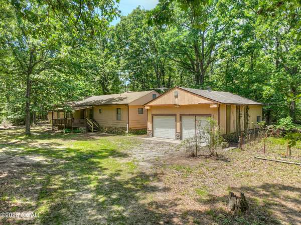 12.4 Acres of Land with Home for Sale in Joplin, Missouri