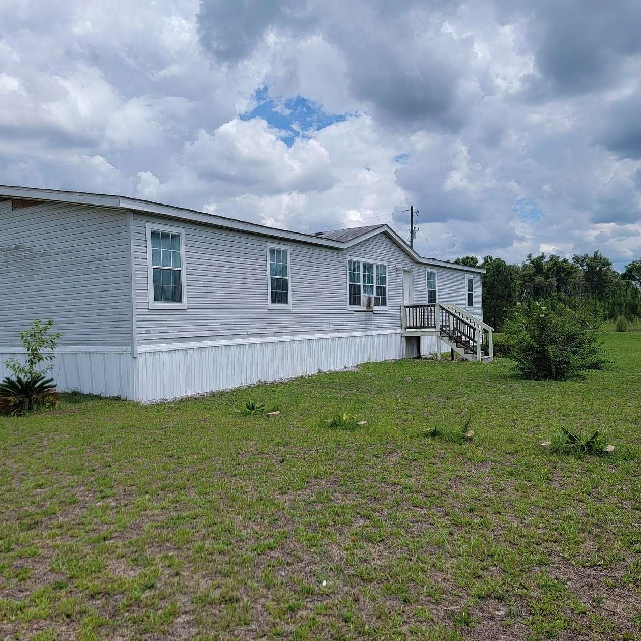 5 Acres of Land with Home for Sale in Lee, Florida