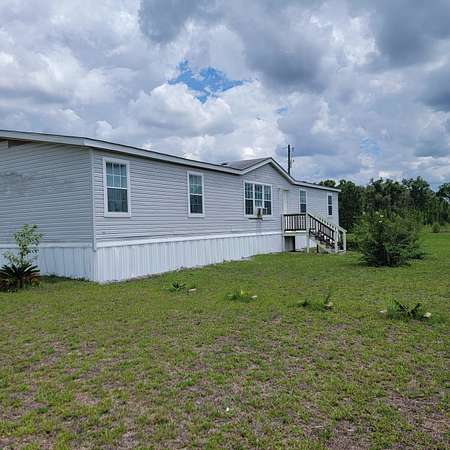 5 Acres of Land with Home for Sale in Lee, Florida