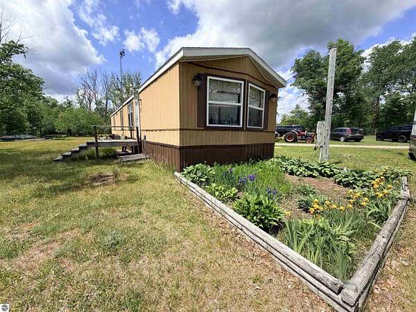 3.6 Acres of Land with Home for Sale in Marion, Michigan