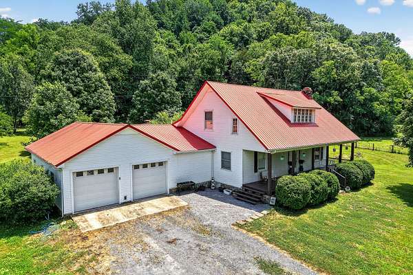 10.3 Acres of Land with Home for Sale in Whitleyville, Tennessee