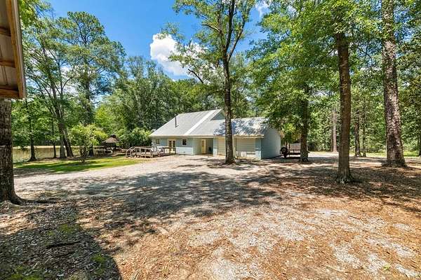 12.2 Acres of Recreational Land with Home for Sale in Poplarville, Mississippi