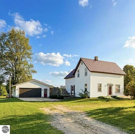 2 Acres of Land with Home for Sale in Kingsley, Michigan