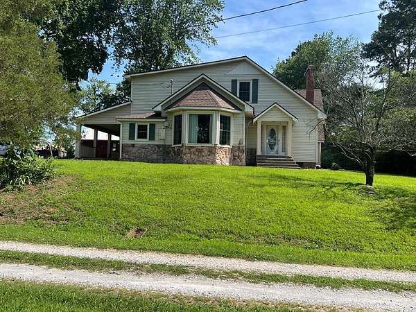 11 Acres of Land with Home for Sale in McKenzie, Tennessee