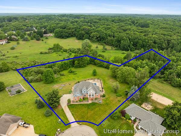3.1 Acres of Land with Home for Sale in Rockford, Michigan