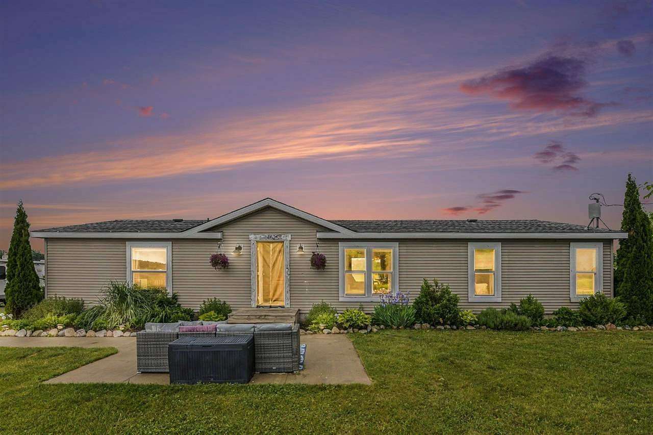 5.6 Acres of Land with Home for Sale in Charlevoix, Michigan