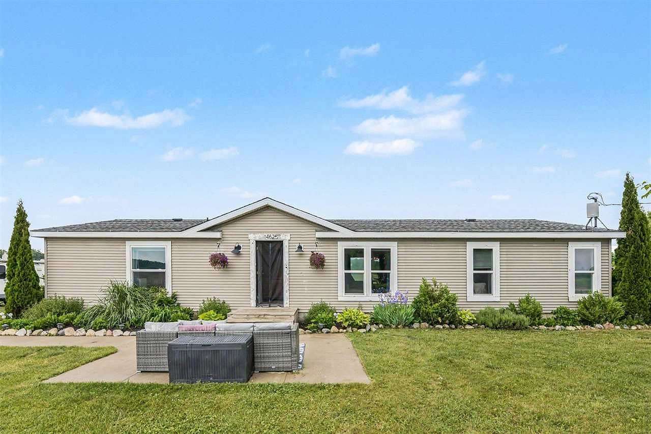 5.6 Acres of Land with Home for Sale in Charlevoix, Michigan