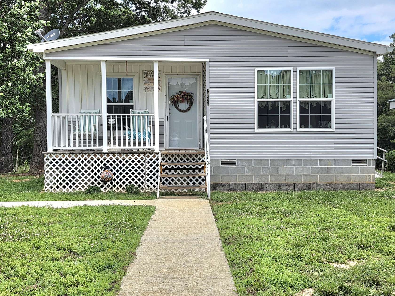 1.5 Acres of Land with Home for Sale in Raymondville, Missouri