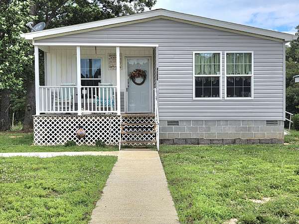 1.5 Acres of Land with Home for Sale in Raymondville, Missouri