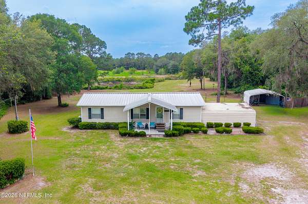 5.26 Acres of Land with Home for Sale in Melrose, Florida