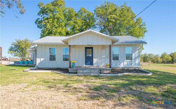 3.19 Acres of Land with Home for Lease in Rogers, Texas