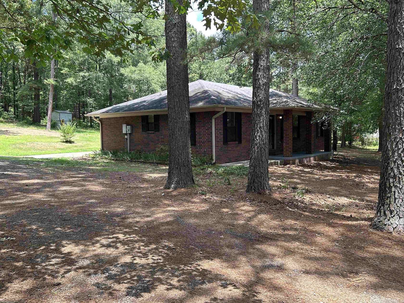 1.5 Acres of Land with Home for Sale in Perryville, Arkansas