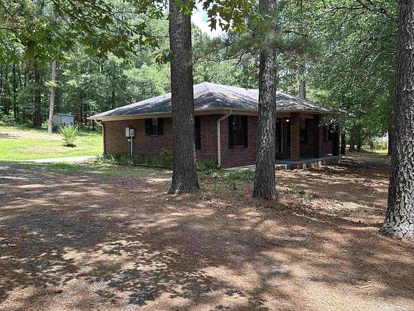 1.5 Acres of Land with Home for Sale in Perryville, Arkansas