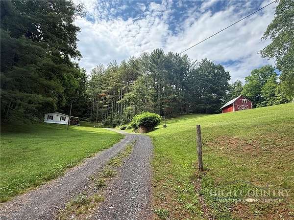 6.72 Acres of Land with Home for Sale in Lansing, North Carolina