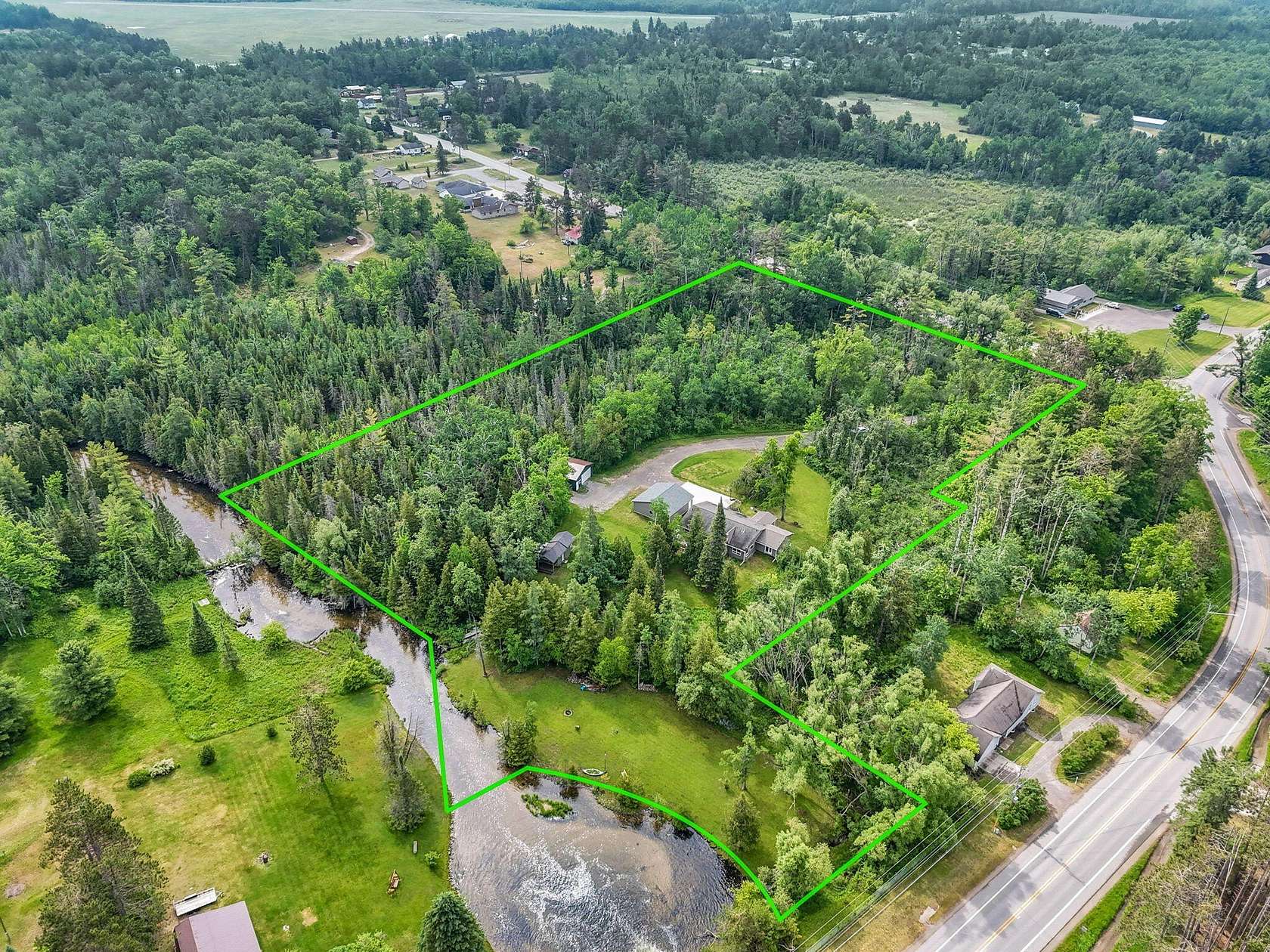 8 Acres of Land with Home for Sale in Atlanta, Michigan