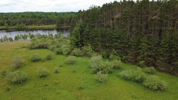 0.77 Acres of Residential Land for Sale in Canadian Lakes, Michigan