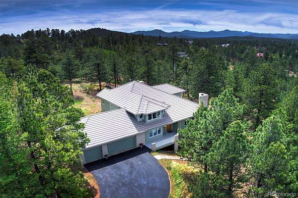 14.8 Acres of Land with Home for Sale in Evergreen, Colorado