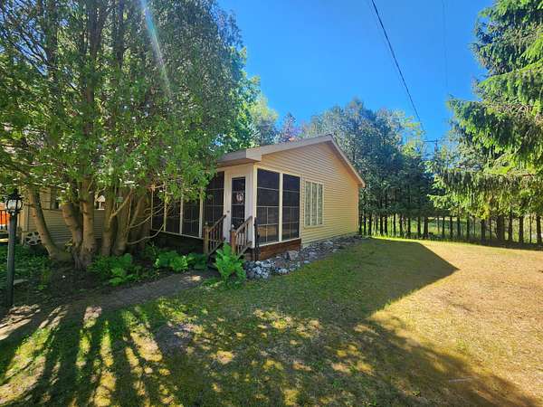 1.5 Acres of Land with Home for Sale in Arcadia, Michigan