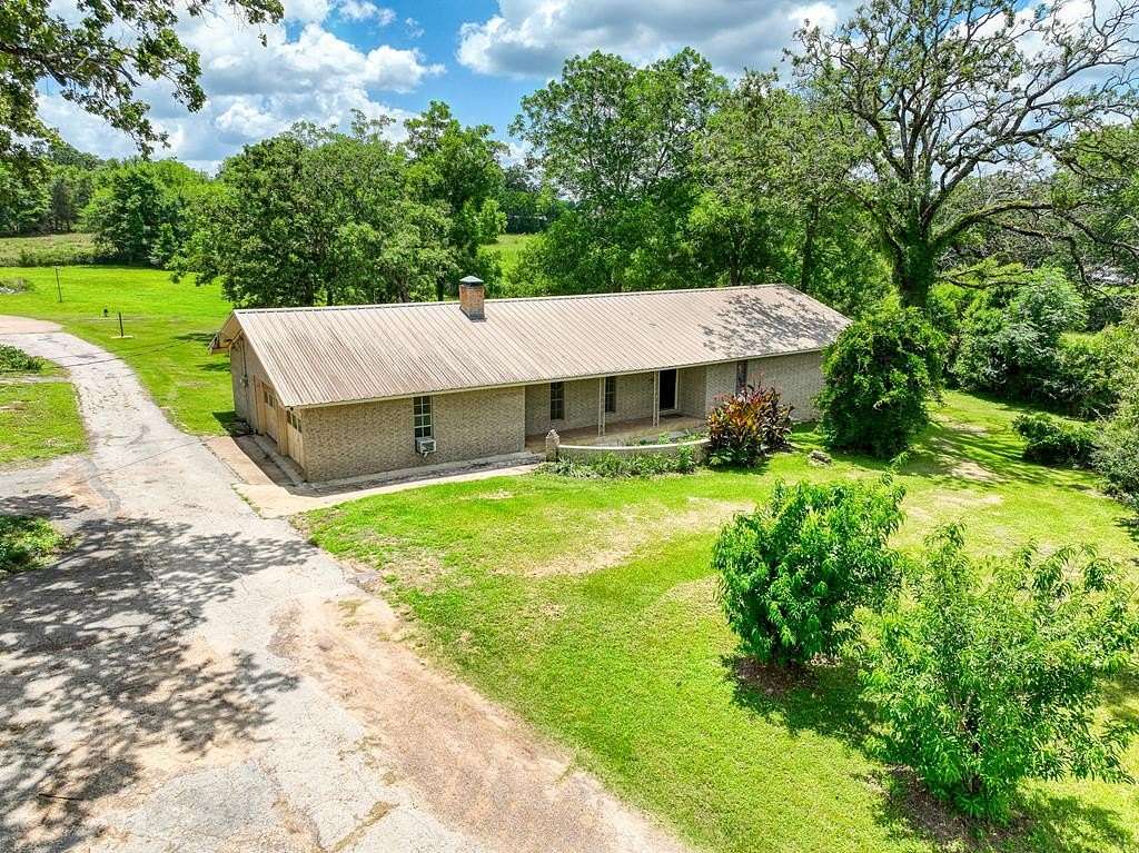 1.78 Acres of Land with Home for Sale in Palestine, Texas
