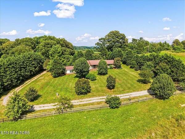 7.77 Acres of Land with Home for Sale in Lenoir City, Tennessee