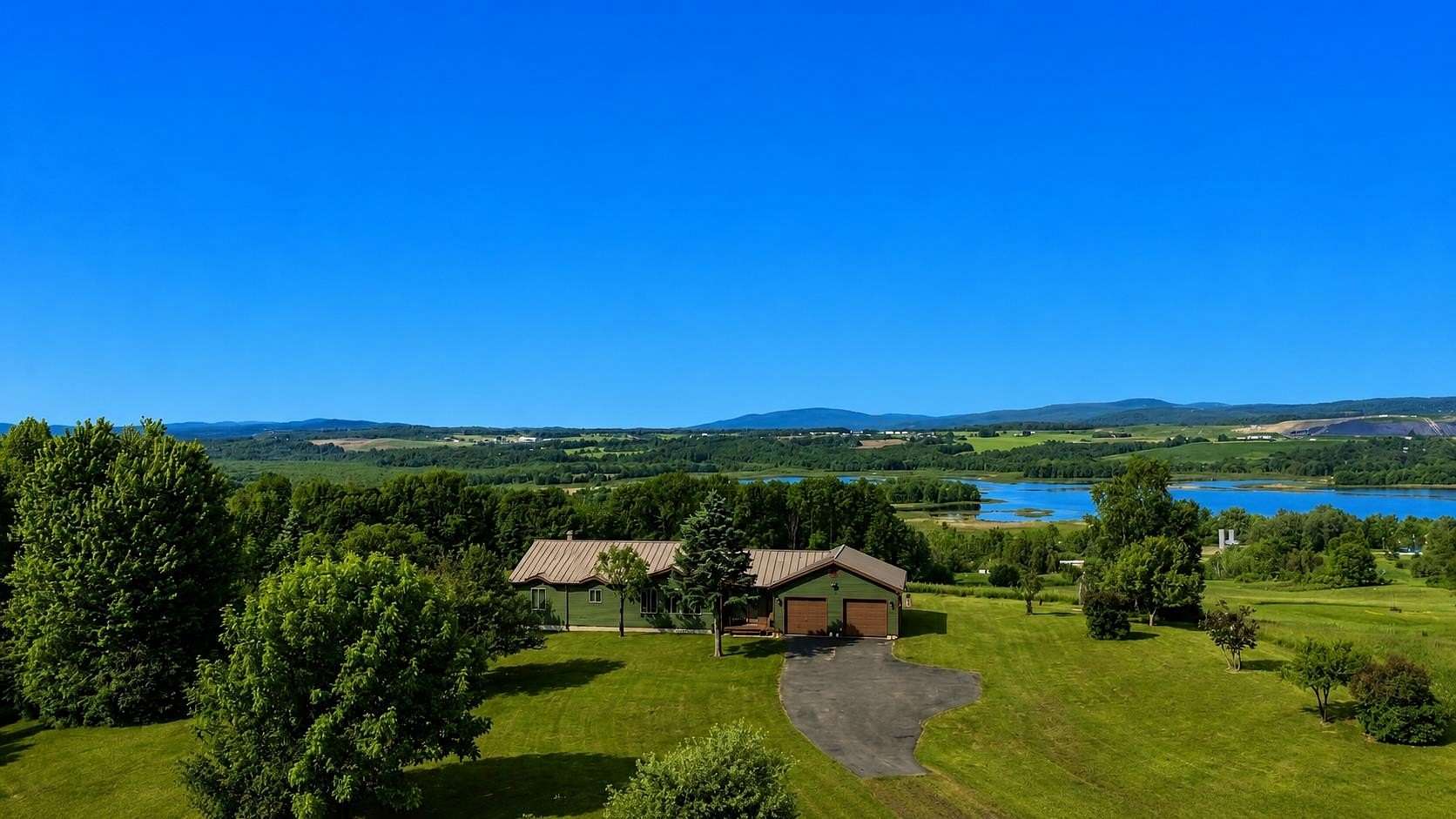 10.3 Acres of Recreational Land with Home for Sale in Derby Town, Vermont