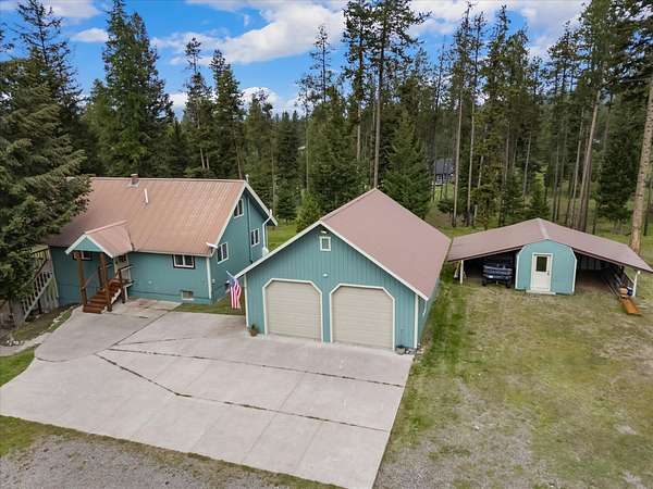 3.13 Acres of Land with Home for Sale in Seeley Lake, Montana