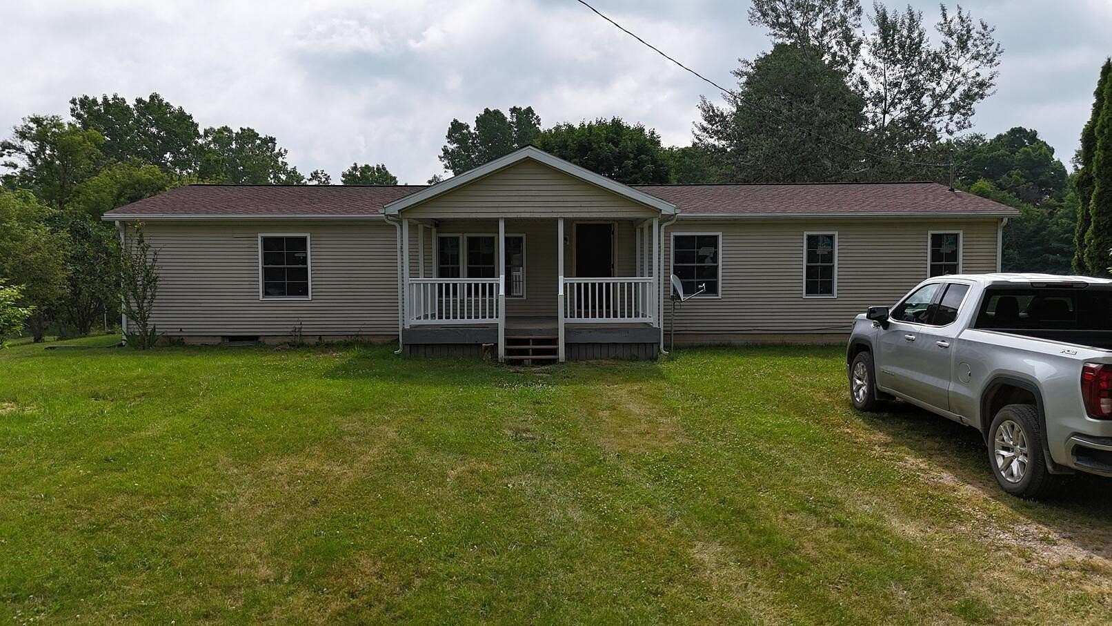 1.74 Acres of Land with Home for Sale in North Adams, Michigan